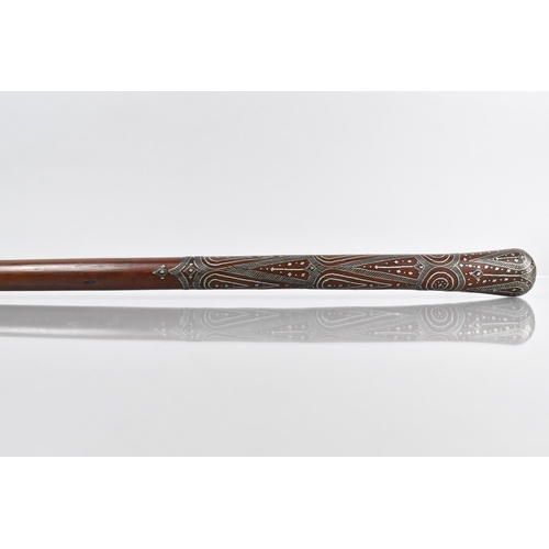 105 - A Colonial Type Hardwood Walking Stick with Well Worked White Metal Inlaid Decoration, 86cm Long