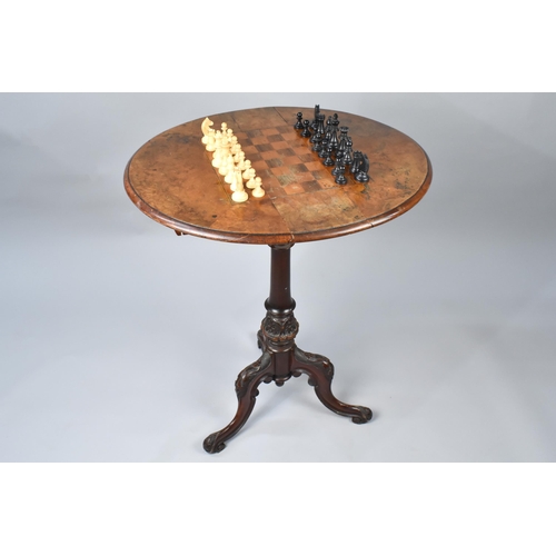 88 - A Late Victorian Walnut Games Table, The Drop Leaf Top with Inlaid Chess Board On Tripod Base Having... 