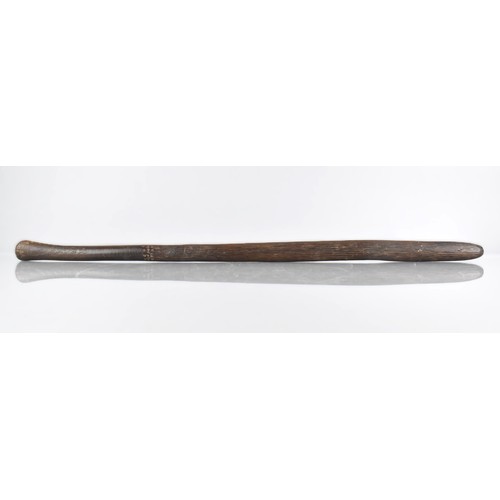 71 - An Aboriginal Throwing Stick with Long Incised Grooves, 66cm Long