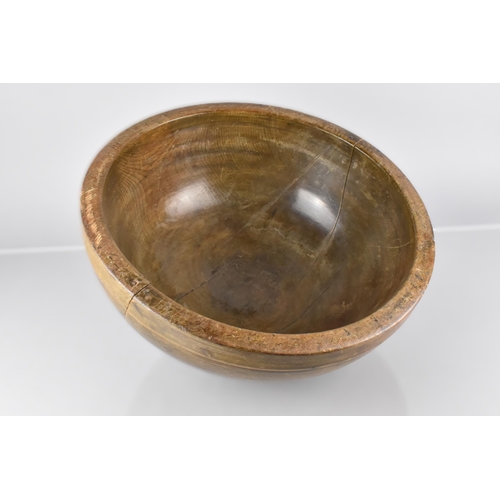 59 - A Large 19th Century Turned Treen Bowl, 40cm Diameter and 16cm High