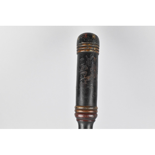 41 - A Victorian Truncheon with Polychrome Painted Decoration on Black Ground, 38cm Long