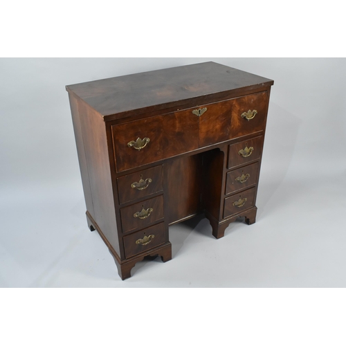 25 - A George III Style Mahogany Veneered Desk with Fitted Secretaire Drawer and Three Drawers Either Sid... 