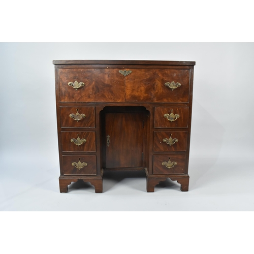 25 - A George III Style Mahogany Veneered Desk with Fitted Secretaire Drawer and Three Drawers Either Sid... 