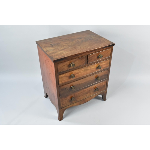 19 - A Georgian Mahogany Chest of Small Proportions having Two Short and Three Graduated Long Drawers, Br... 