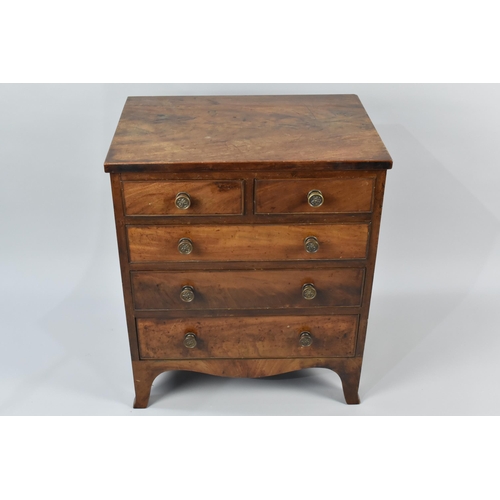 19 - A Georgian Mahogany Chest of Small Proportions having Two Short and Three Graduated Long Drawers, Br... 