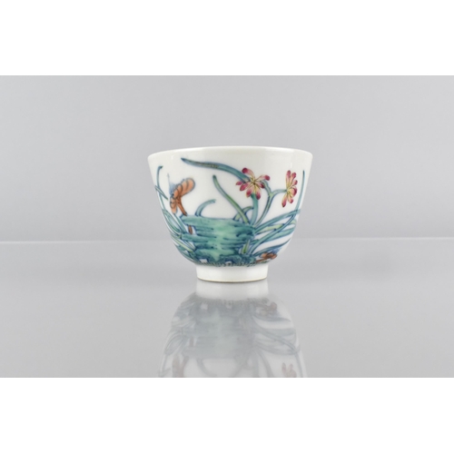 416 - A Chinese Porcelain Doucai Tea Bowl Decorated with Flowers, Six Character Mark for Guangxu, 6cm High