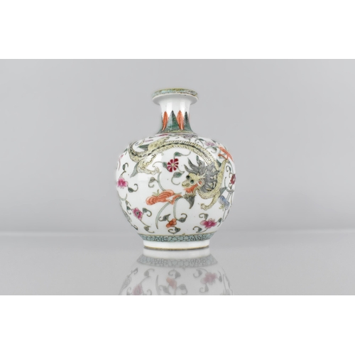 400 - A Chinese Qing Period Porcelain Bottle Vase Decorated in the Famille Rose Palette with Dragons Among... 