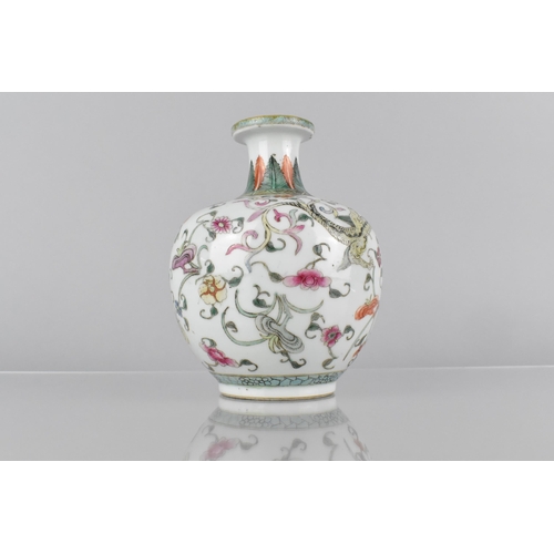 400 - A Chinese Qing Period Porcelain Bottle Vase Decorated in the Famille Rose Palette with Dragons Among... 