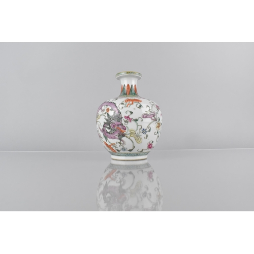 400 - A Chinese Qing Period Porcelain Bottle Vase Decorated in the Famille Rose Palette with Dragons Among... 