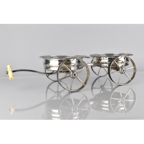 205 - A 19th Century Sheffield Plated Coaster Carriage, the Two Fixed Coasters with Reeded Trim Turned Woo... 