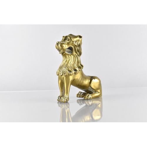 145 - A 18th/19th Century Bronze Study of a Lion Modelled Seated, 11cm High