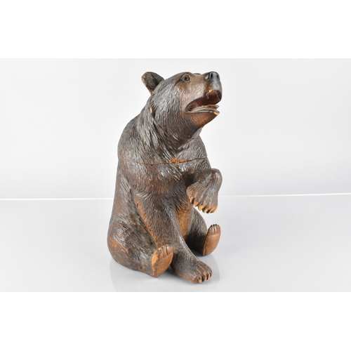 65 - A 19th Century Carved Black Forest Bear Tobacco Jar/Caddy, Modelled Seated with One Paw Raised, the ... 