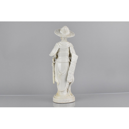 380 - A Chinese Qing Dynasty Porcelain Study of a Soldier Modelled Standing Wearing Finley Detailed Armour... 