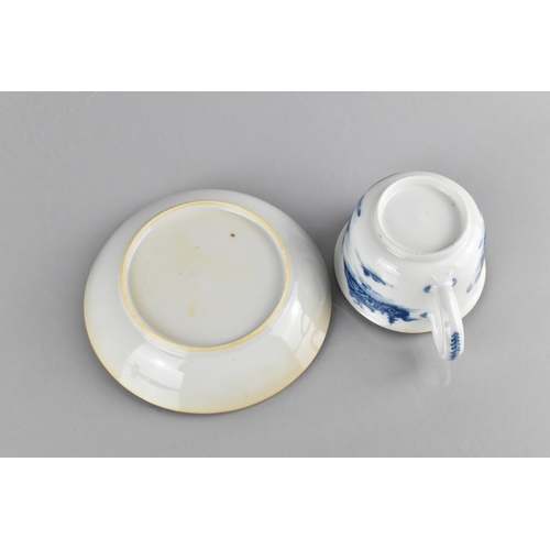 418 - A Chinese Qing Dynasty Porcelain Blue and White Cup and Saucer Decorated with River Village Scene, 1... 