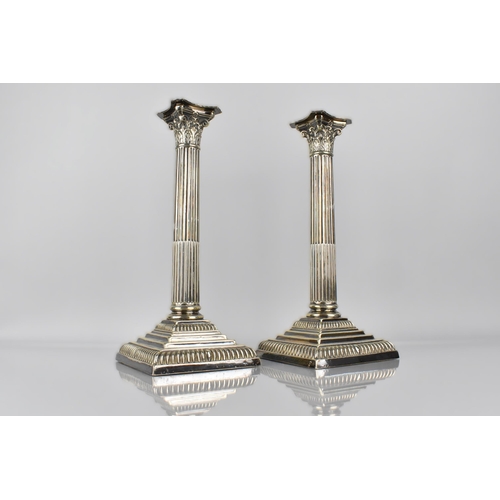 209 - A Pair of Early 20th Century Silver Plated Corinthian Column Candlesticks on Square Tapering Bases, ... 