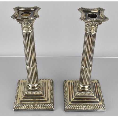 209 - A Pair of Early 20th Century Silver Plated Corinthian Column Candlesticks on Square Tapering Bases, ... 