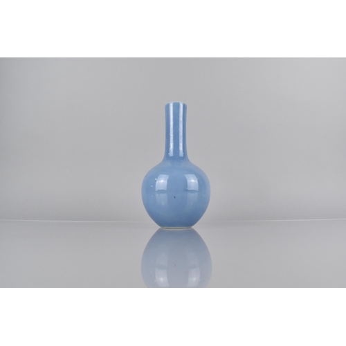 383 - A Chinese Porcelain Monochrome Bottle Vase, 18cm High