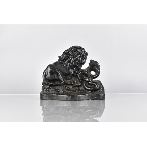 125 - A 19th Century Cast Iron Doorstop, Modelled as The Lion and Snake, an Allegory of Strength over Adve... 