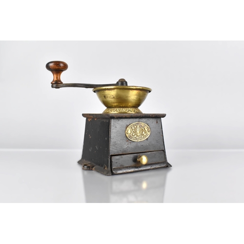 126 - A 19th Century Cast Iron Coffee Grinder with a Brass Label 'A. Kendrick and Sons Patent Coffee Mill'... 