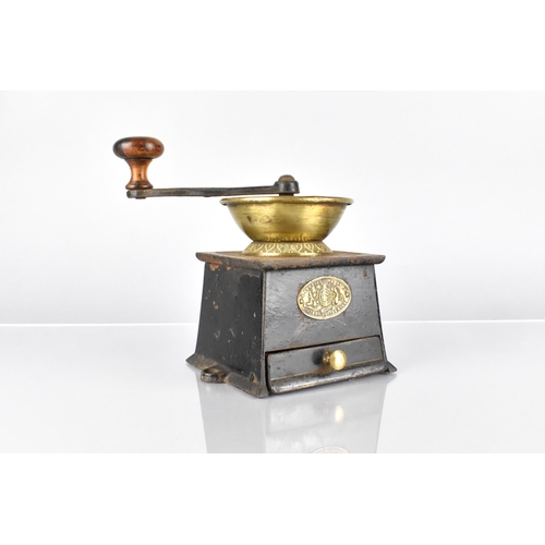 126 - A 19th Century Cast Iron Coffee Grinder with a Brass Label 'A. Kendrick and Sons Patent Coffee Mill'... 