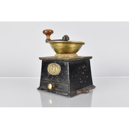 126 - A 19th Century Cast Iron Coffee Grinder with a Brass Label 'A. Kendrick and Sons Patent Coffee Mill'... 