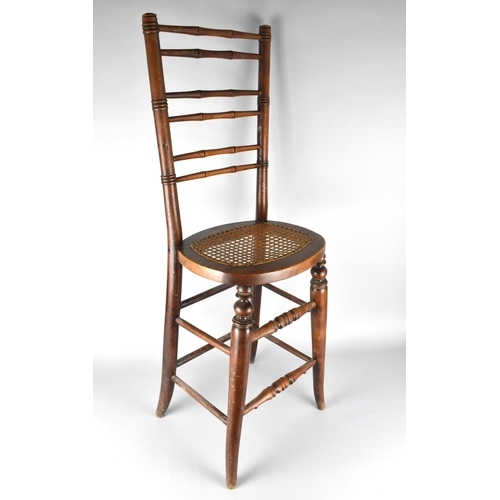 446 - A Late 19th Century Faux Bamboo Framed and Cane Seated Correction Chair, 93.5cm High