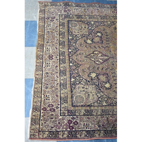 191 - A Victorian Persian Handmade Lavar Kirman Rug, C.1890, 208x131cms