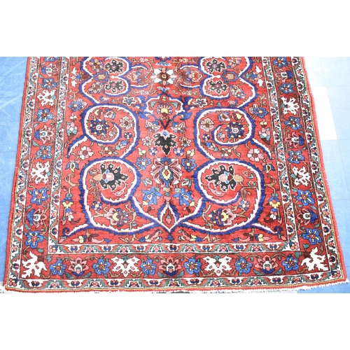 194 - A Fine Persian Hand Made Bakhtiar Rug, 213x143cms