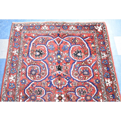 194 - A Fine Persian Hand Made Bakhtiar Rug, 213x143cms