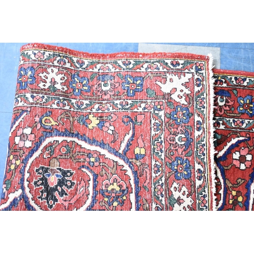 194 - A Fine Persian Hand Made Bakhtiar Rug, 213x143cms