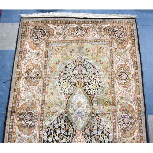 199 - A Silk Kashan Hand Made Rug, 198x120cms