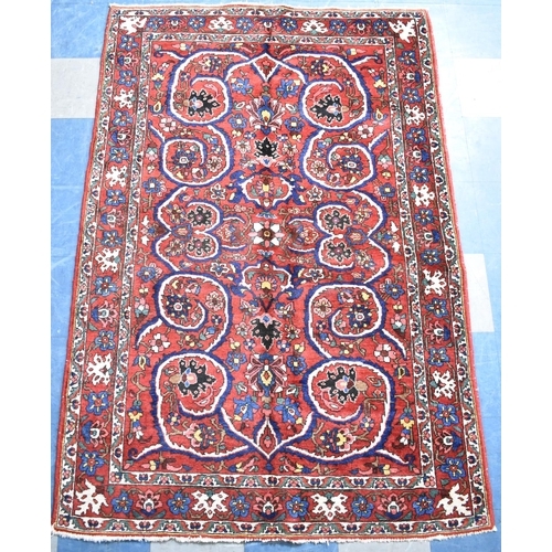 194 - A Fine Persian Hand Made Bakhtiar Rug, 213x143cms