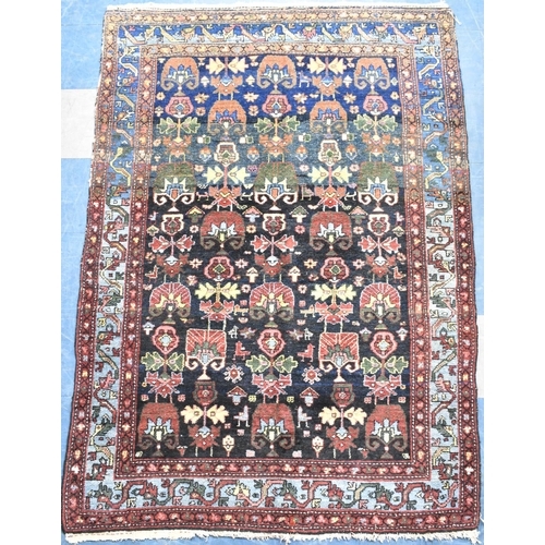 195 - A Persian Hand Made Farahan Rug C.1920, 204x144cms