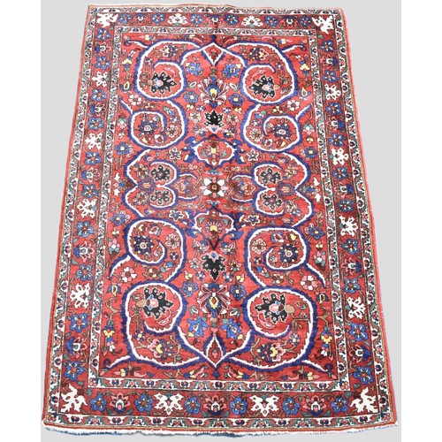 194 - A Fine Persian Hand Made Bakhtiar Rug, 213x143cms