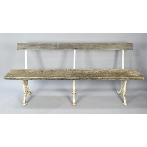 434 - A Victorian White Painted Cast Iron and Wood Backed and Seated Bench, The Three Cast Supports of Scr... 