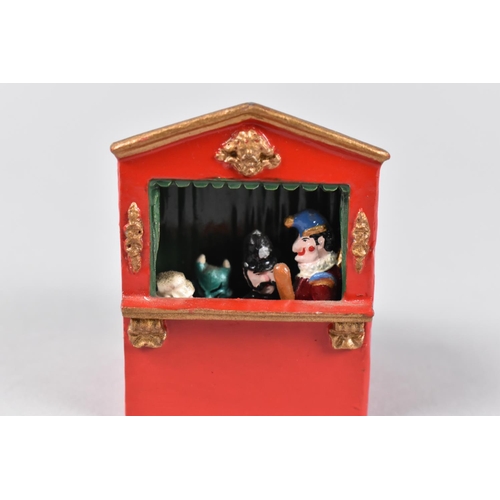 12 - A Vintage Cold Painted Metal Miniature Punch and Judy Theatre with Four Levered Characters, by Ricor... 