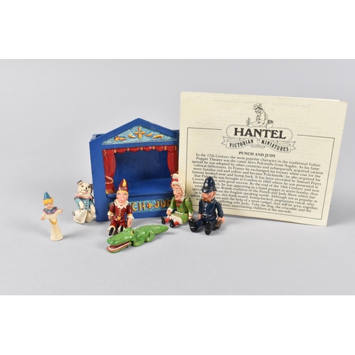 13 - A Hantel Miniature Punch and Judy Theatre in Cold Painted Metal Together with Six Articulated Figure... 