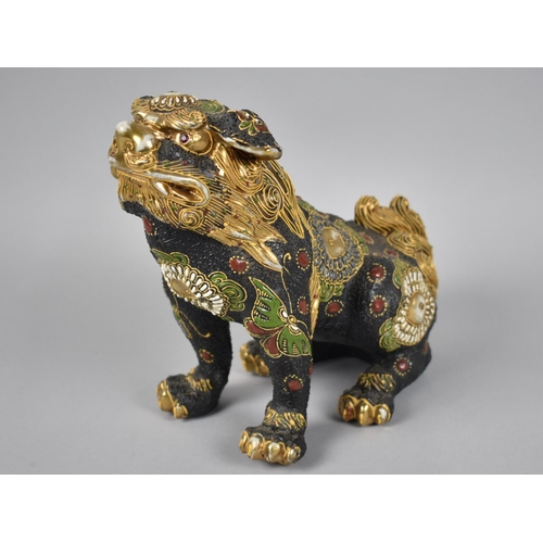 237 - A Japanese Satsuma Study of a Seated Temple Dog, 20cms High