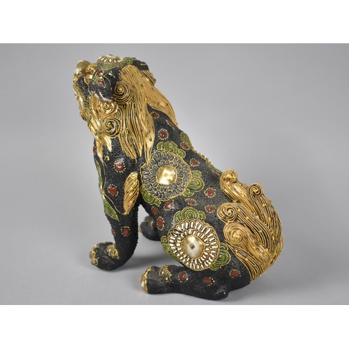 237 - A Japanese Satsuma Study of a Seated Temple Dog, 20cms High