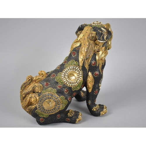 237 - A Japanese Satsuma Study of a Seated Temple Dog, 20cms High