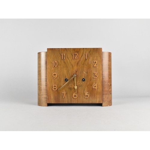 25 - An Art Deco Walnut Mantel Clock with Eight Day Movement, Complete with Pendulum, 27cms Wide