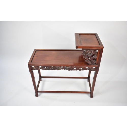 250 - A Chinese Hardwood Two Tier Stand with Pierced Carved Dragon Decoration and Apron, 71cms Long