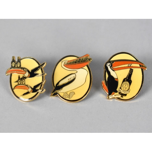 30 - A Set of Three Enamelled Guinness Lapel Badges