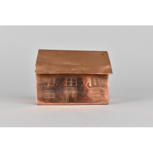 35 - A Trench Art Copper Money Box in the Form of a House, 10cms Wide