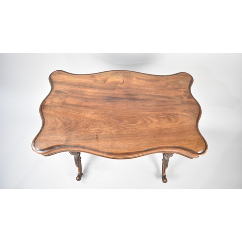 41 - A Late Victorian Mahogany Serpentine Shaped Top Centre Table with Carved Turned Stretcher and Lyre S... 