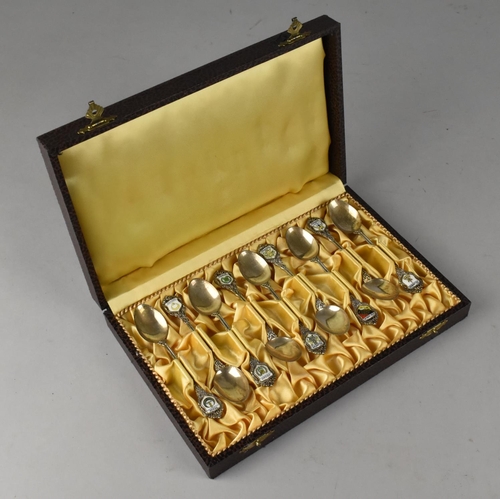 505 - A Cased Set of Nine Sterling Silver Souvenir Teaspoons