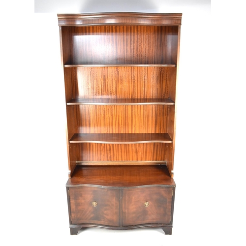 546 - A Reproduction Serpentine Front Mahogany Bookcase with Cupboard Base, 90cms Wide 182cms High