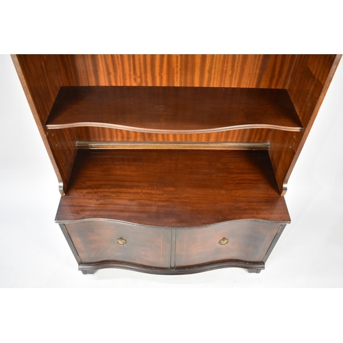 546 - A Reproduction Serpentine Front Mahogany Bookcase with Cupboard Base, 90cms Wide 182cms High