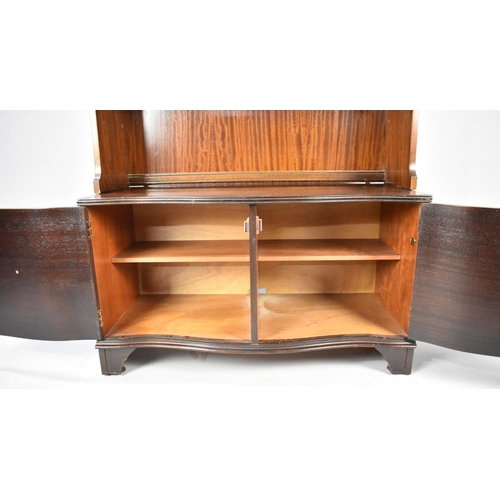 546 - A Reproduction Serpentine Front Mahogany Bookcase with Cupboard Base, 90cms Wide 182cms High