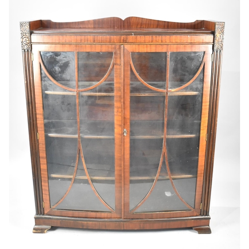 556 - A Mid 20th Century Mahogany Bow Fronted Glazed Bookcase or Display Case with Reeded Pilasters, galle... 